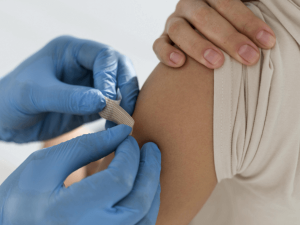 Girl taking travel vaccine